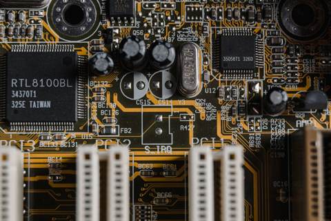 NXP Semiconductors, Universal Display Shares Fall