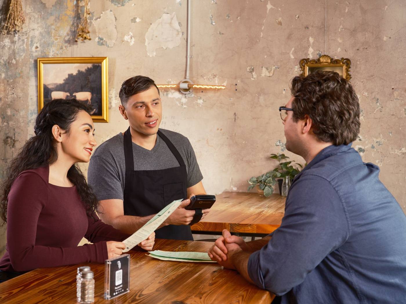 Restaurant server taking order